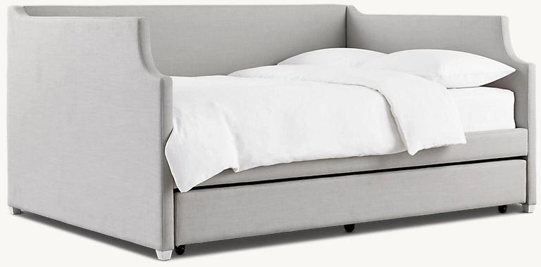 Detail view of Annika Upholstered Daybed With Trundle showing fabric bed design