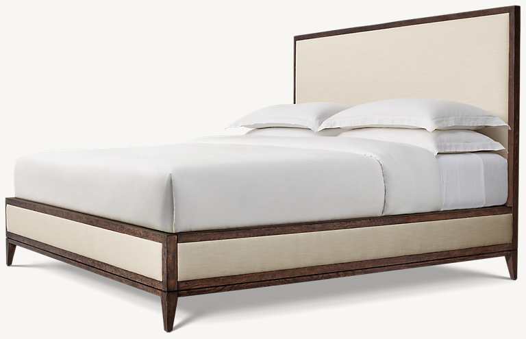 Detail view of Cayden Campaign Panel Bed showing oak panel bed design