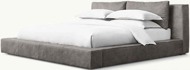 Detail view of Cloud Slipcovered Platform Bed showing wood bed design