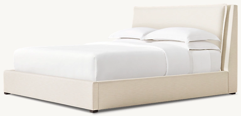 Detail view of Cosette Fabric Panel Bed showing oak panel bed design