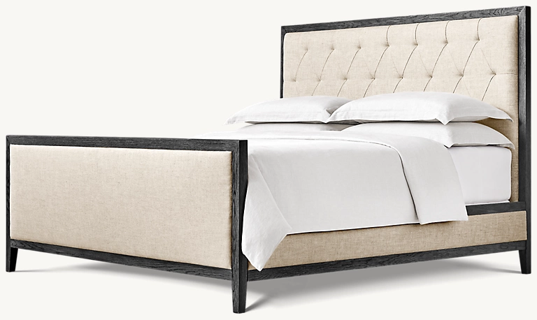 Detail view of French Contemporary Leather Diamond-Tufted Panel Bed With Footboard showing oak panel bed design