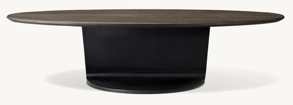 Detail view of I-Beam Round Coffee Table showing oak coffee table design
