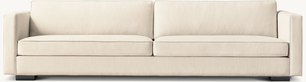Detail view of Maddox Slim-Arm Sofa showing oak sofa design
