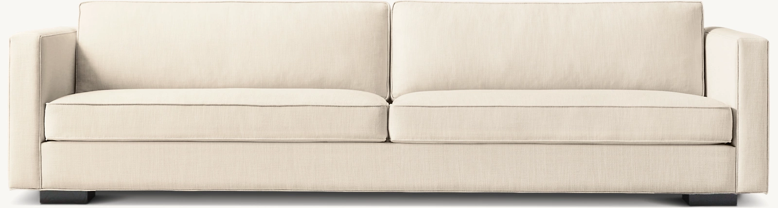 Detail view of Maddox Slim-Arm Sofa showing oak sofa design