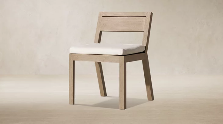 Detail view of Merida Side Chair showing teak side chair design