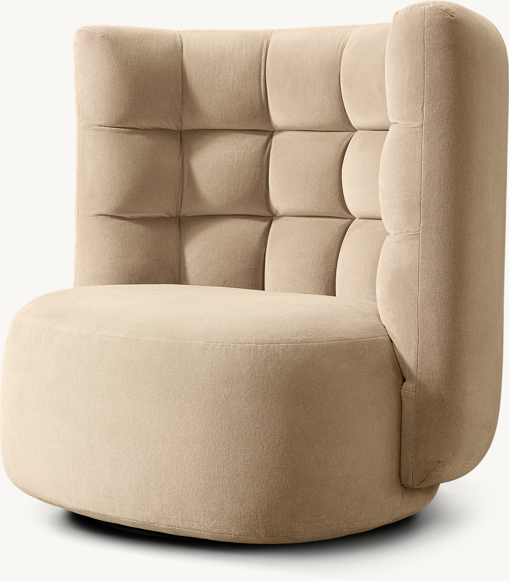 Detail view of Mira Swivel Chair showing fabric armchair design