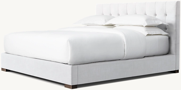 Detail view of Modena Fabric Box-Tufted Panel Platform Bed showing oak bed design