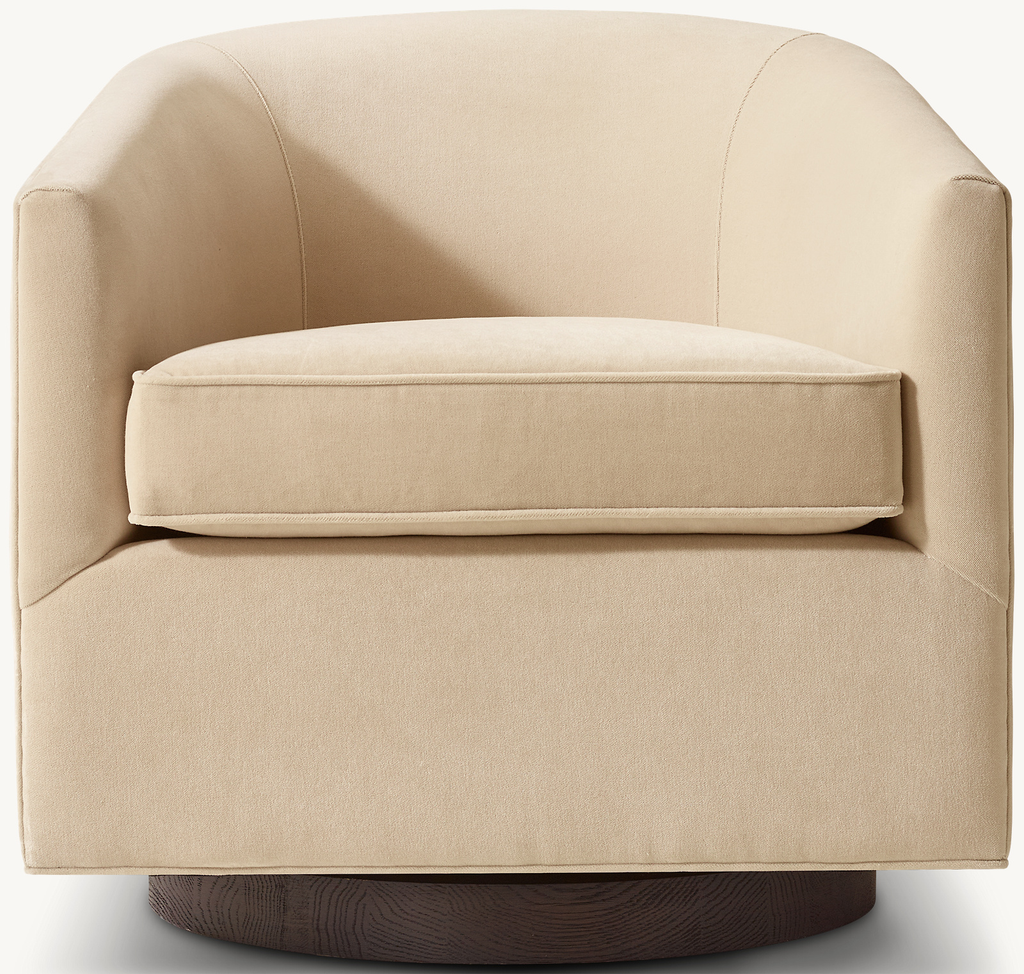 Detail view of Reginald Swivel Chair showing oak armchair design