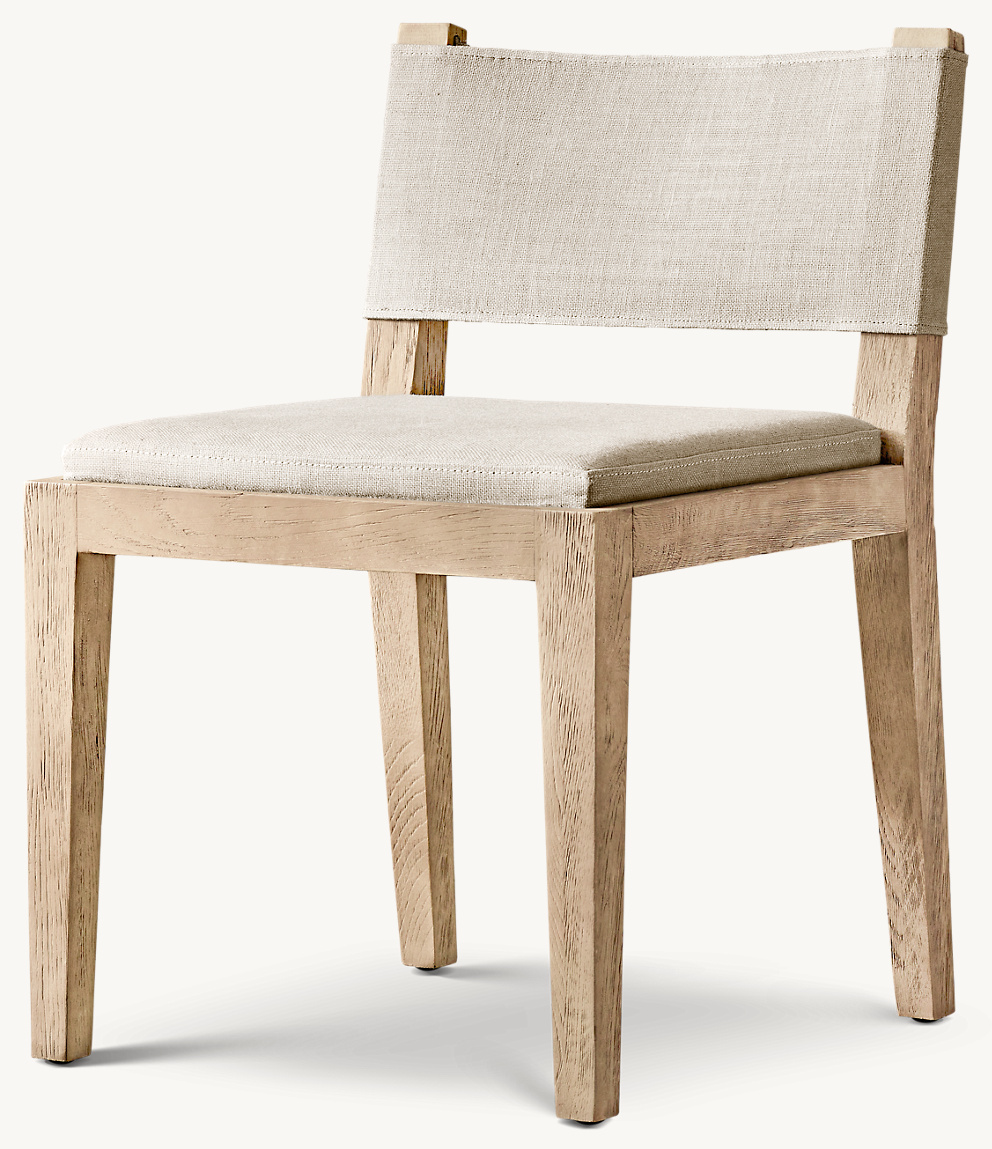 Detail view of Saddle Side Chair showing wood side chair design