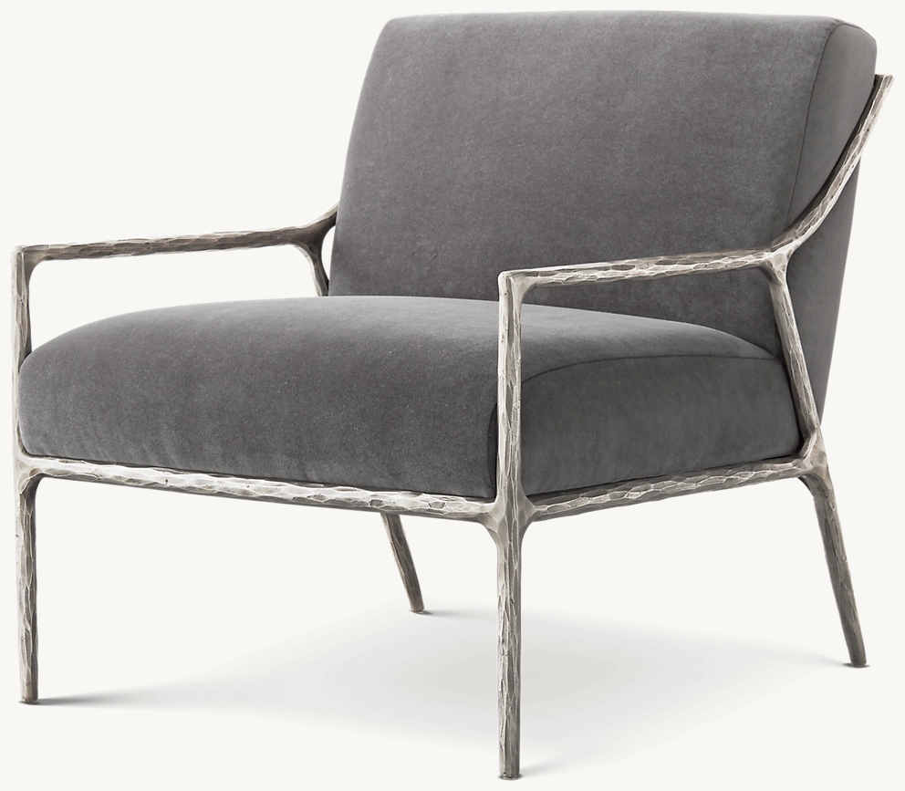 Detail view of Thaddeus Slope Arm Chair showing wood armchair design